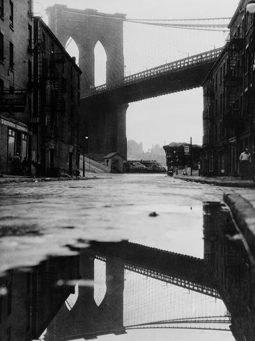 Puddle Reflecting Brooklyn Bridge Photographic Print