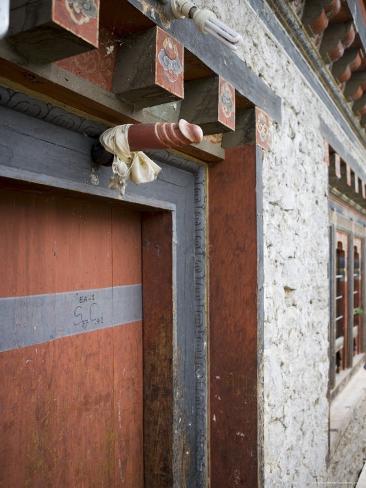 Phallus Above House Door to Ward off Evil Spirits, Jankar, Bumthang Valley, Bhutan Photographic Print