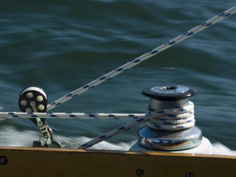 Close View of a Winch and Jib Sheet on a Sailboat under Sail 
