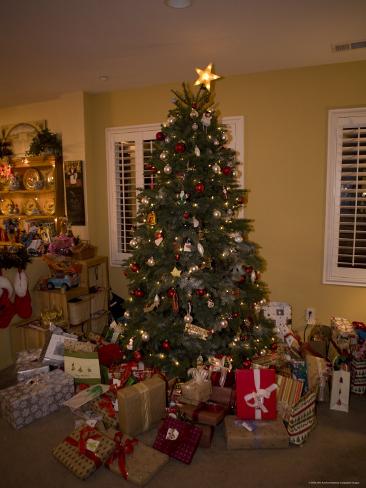 christmas tree with gifts inside a home photographic print christmas tree with gifts inside a home photographic print