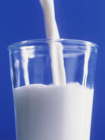 ulrike koeb pouring a glass of milk - best and delicious breakfasts