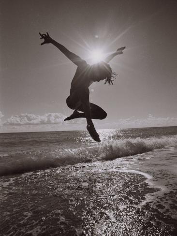 Silhouette of Dancer Jumping Over Atlantic Ocean Photographic Print