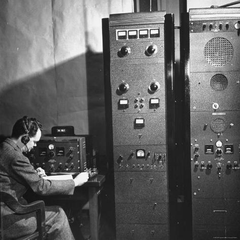 Agent of the FBI Listening to a Message Being Transferred Via Radio Premium Photographic Print