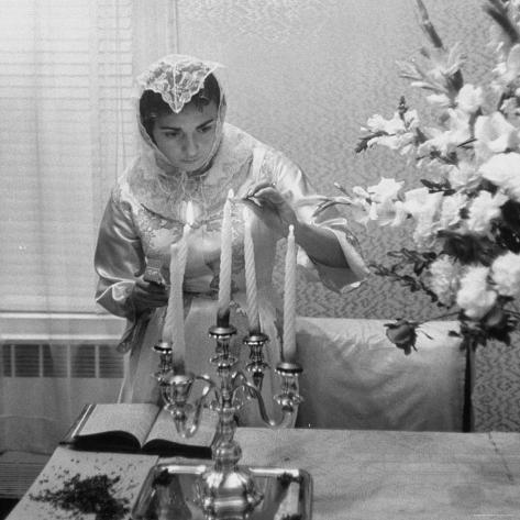 Woman Lighting Candles During Hasidic Jewish Wedding Ceremony Photographic