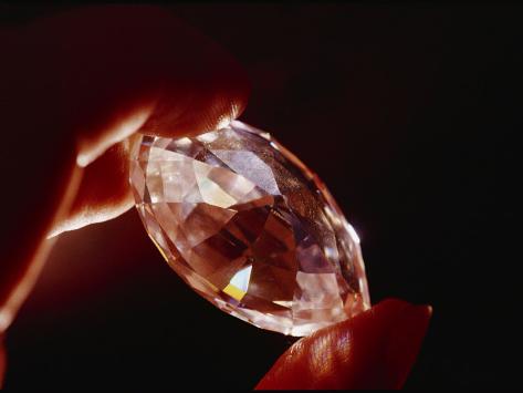 A Huge Nine-Carat Diamond Glistens with Light Photographic Print