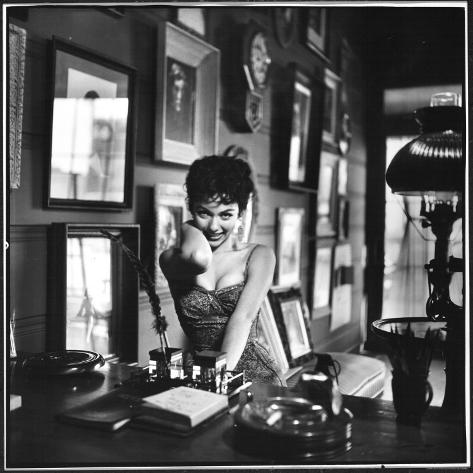 http://imgc.allpostersimages.com/images/P-473-488-90/27/2757/N66TD00Z/posters/loomis-dean-actress-rita-moreno-imitating-the-sexy-wild-type.jpg