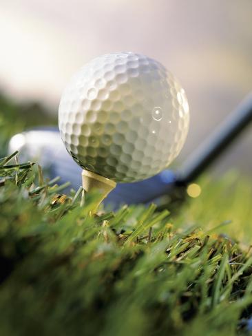  - eric-kamp-golf-ball-on-wooden-tee-with-driver-in-background