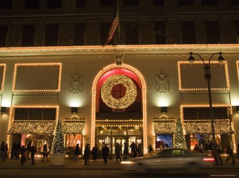 A Store Front Lit up and Decorated for Christmas Time, New York City, New York Photographic Print