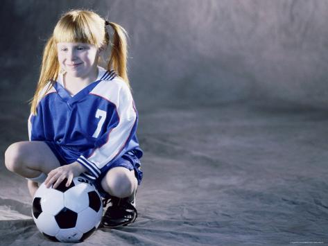 Portrait of a Girl Squatting Holding a Soccer Ball Photographic Print