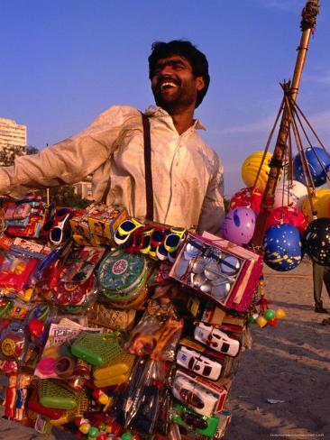 dallas-stribley-toy-vendor-and-merchandise-on-chowpetty-beach-mumbai-maharashtra-india.jpg