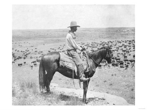 cowboy-on-horseback-watches-his-herd-photograph-texas.jpg