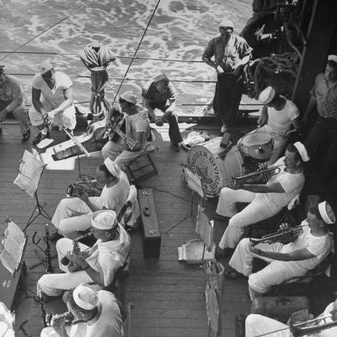 ralph-morse-members-of-ship-s-band-aboard-us-navy-cruiser-playing-on-deck-daily-musical-practice-during-wwii.jpg