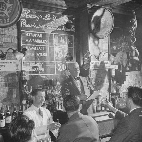 Man Reading About Election Straw Votes at Harry's New York Bar Photographic Print