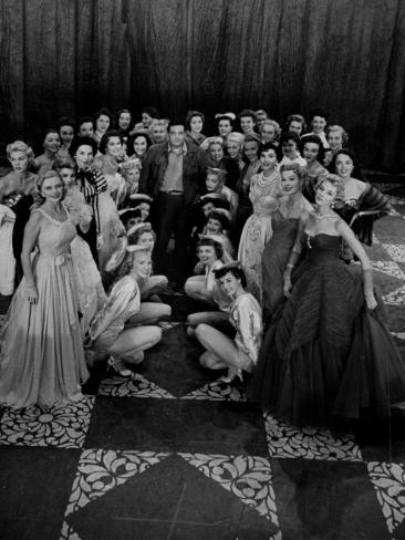Entertainer Jackie Gleason Standing in the Midst of a Stage Full of the Glamorous Chorus Girls Premium Photographic Print