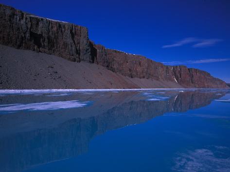  - nick-norman-spring-melt-water-on-top-of-sea-ice-with-bird-cliffs