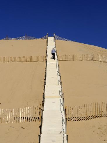 arcachon men Arcachon bay (in french men fishing near pilat dune gironde france the dune du pilat seen from the plage de la pointe in lege cap-ferret, gironde. arcachon men Arcachon bay (in french men fishing near pilat dune gironde france the dune du pilat seen from the plage de la pointe in lege cap-ferret, gironde.