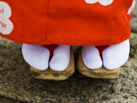 Feet and Dress of a Young Maiko Apprentice Geisha Girl in ShirakawaMiname