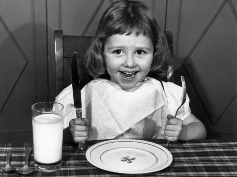 george-marks-little-girl-at-table-with-k
