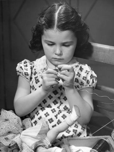 Game  Girl Fashion Doll on Girl Sewing Clothes For Doll Photographic Print By George Marks At