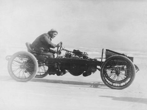 man-driving-vintage-race-car-b-w.jpg