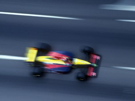 Auto Racing Trophies on Blurred F1 Auto Racing Action Photographic Print At Allposters Com