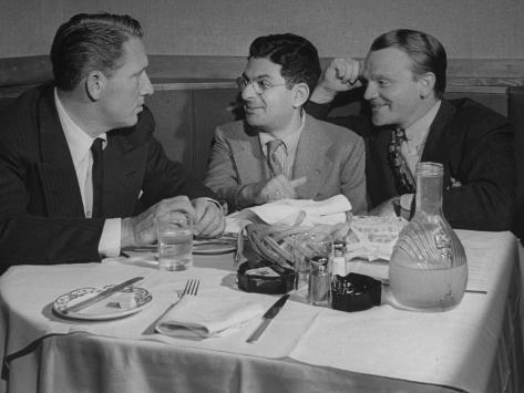 columnist-sidney-skolsky-eating-dinner-w