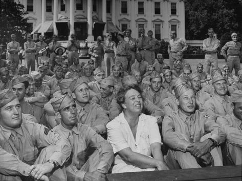 http://imgc.allpostersimages.com/images/P-473-488-90/60/6053/VK5D100Z/posters/first-lady-eleanor-roosevelt-singing-with-a-large-group-of-us-soldiers.jpg