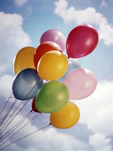 h-armstrong-roberts-bunch-of-multicolored-balloons-in-blue-sky-with-white-clouds.jpg