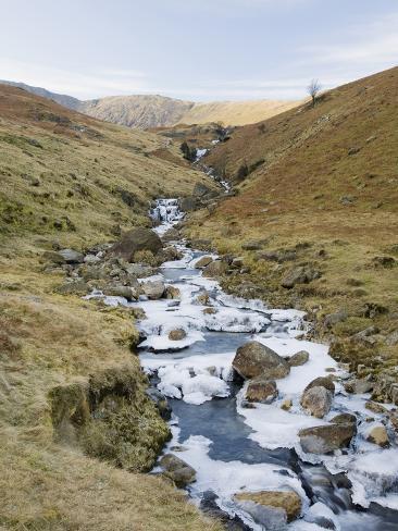 ashley-cooper-ice-on-rocks-in-a-winter-s