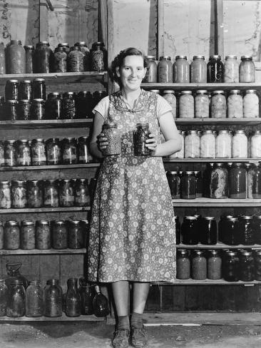 Housewife Proudly Displays Her Home Grown and Canned Food. Colorado, Sept. 1939 Photo