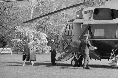 http://imgc.allpostersimages.com/images/P-473-488-90/69/6927/W3JX100Z/posters/president-jimmy-carter-carrying-his-own-luggage-a-to-the-presidential-helicopter-1978.jpg