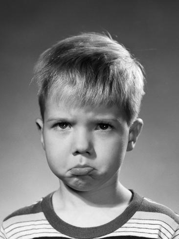 1950s-portrait-blond-boy-sad-grumpy-angry-pouting-facial-expression.jpg