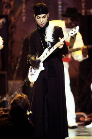http://imgc.allpostersimages.com/images/P-473-488-90/92/9286/LQJ5500Z/posters/american-singer-prince-prince-rogers-nelson-on-stage-at-the-naacp-image-awards-1999.jpg