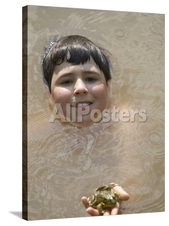 9 Year Old Boy Showing Off His Frog In A Pond Woodstock New York