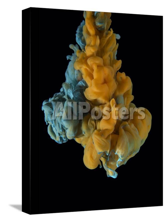 color drop on black background yellow orange blue photographic