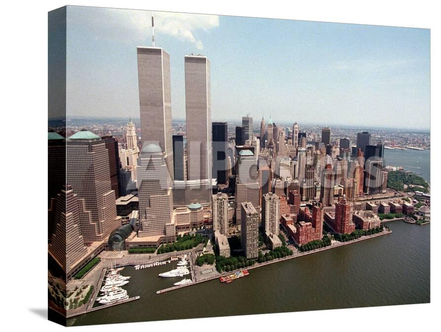 The Twin Towers Of The World Trade Center Rise Above The New York Skyline Photographic Print Allposters Com