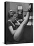 Dancer Mary Ellen Terry Talking with Her Legs Up in Telephone Booth-Gordon Parks-Stretched Canvas