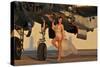 Beautiful 1940's Pin-Up Girl Standing with a B-25 Bomber-null-Stretched Canvas