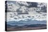 Dramatic Clouds Billow Above a Landscape with the Cordillera Real in the Distance-Alex Saberi-Stretched Canvas