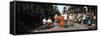 Spectator Looking at Street Musician Performing, Bourbon Street, New Orleans, Louisiana, USA-null-Framed Stretched Canvas