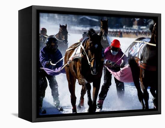 Skijouring, Skiing Behind a Race Horse at Full Gallop, on the Frozen Lake at St,Moritz, Switzerland-John Warburton-lee-Framed Stretched Canvas