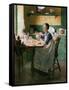 Fixing the lamp (or Woman in Kitchen)-Norman Rockwell-Framed Stretched Canvas