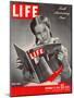 10th Anniversary Features Young Girl Reading First Issue of LIFE, November 25, 1946-Herbert Gehr-Mounted Photographic Print