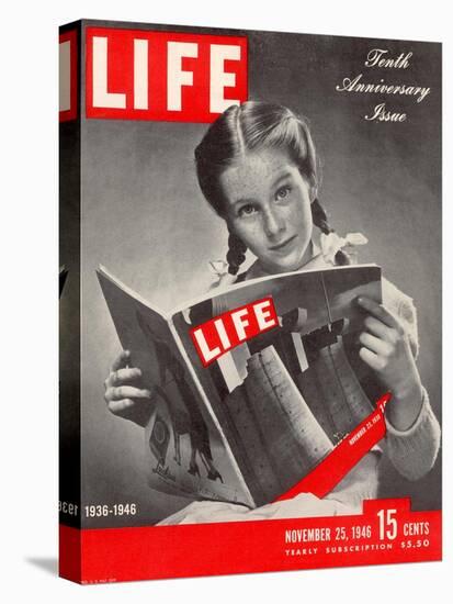 10th Anniversary Features Young Girl Reading First Issue of LIFE, November 25, 1946-Herbert Gehr-Stretched Canvas