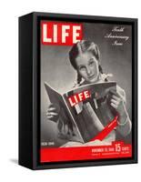 10th Anniversary Features Young Girl Reading First Issue of LIFE, November 25, 1946-Herbert Gehr-Framed Stretched Canvas