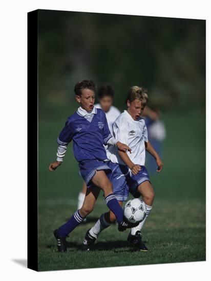 11 Year Old Boys Soccer Action-null-Stretched Canvas