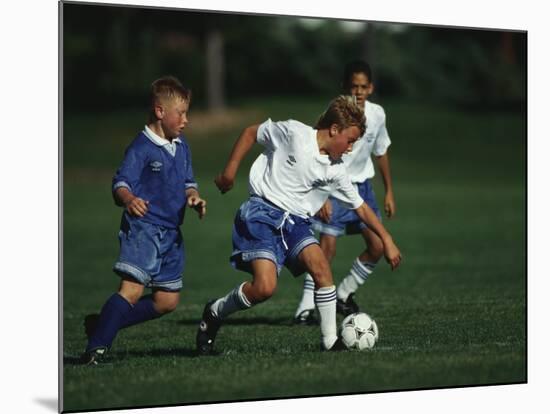 11 Year Old Boys Soccer Action-null-Mounted Photographic Print
