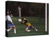 11 Year Old Boys Soccer Goalie in Action-null-Stretched Canvas