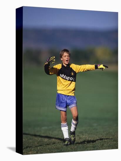 11 Year Old Boys Soccer Goalie in Action-null-Stretched Canvas