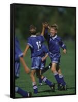 11 Year Old Boys Soccer Player Celebates a Goal-null-Framed Stretched Canvas
